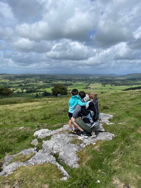 Family looking at view over Cartmel and Morecambe Bay