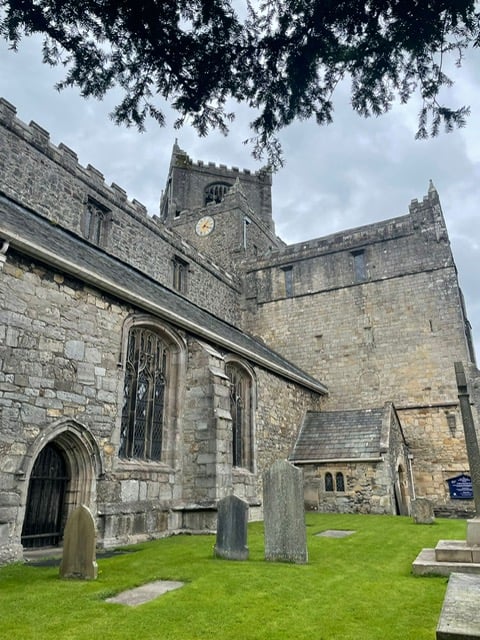 Cartmel Priory from the outside, showing the entrance.