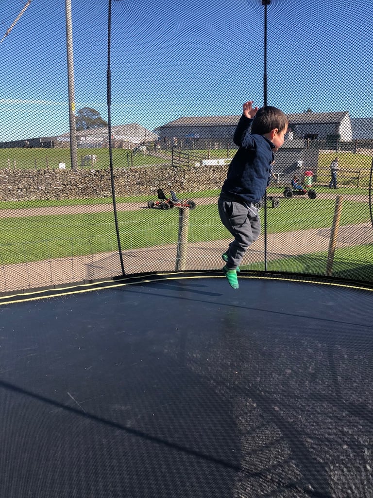 Trampolining at Lakeland Maze Farm park in Cumbria.