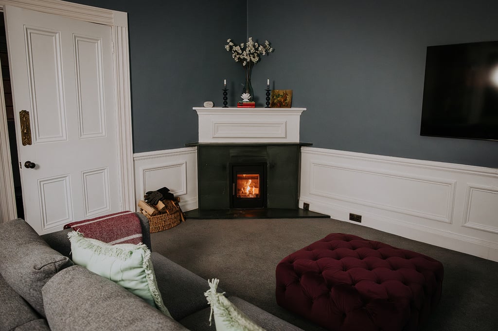The fire at the Pheasant Lodge. wide doorway Pheasant Lodge