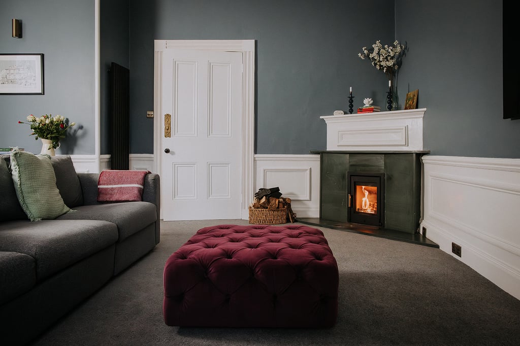 Log burner in the lounge at the pheasant lodge