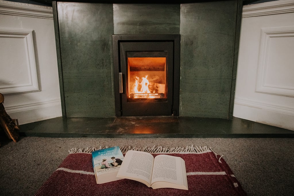 the log burner in the pheasant lodge lounge