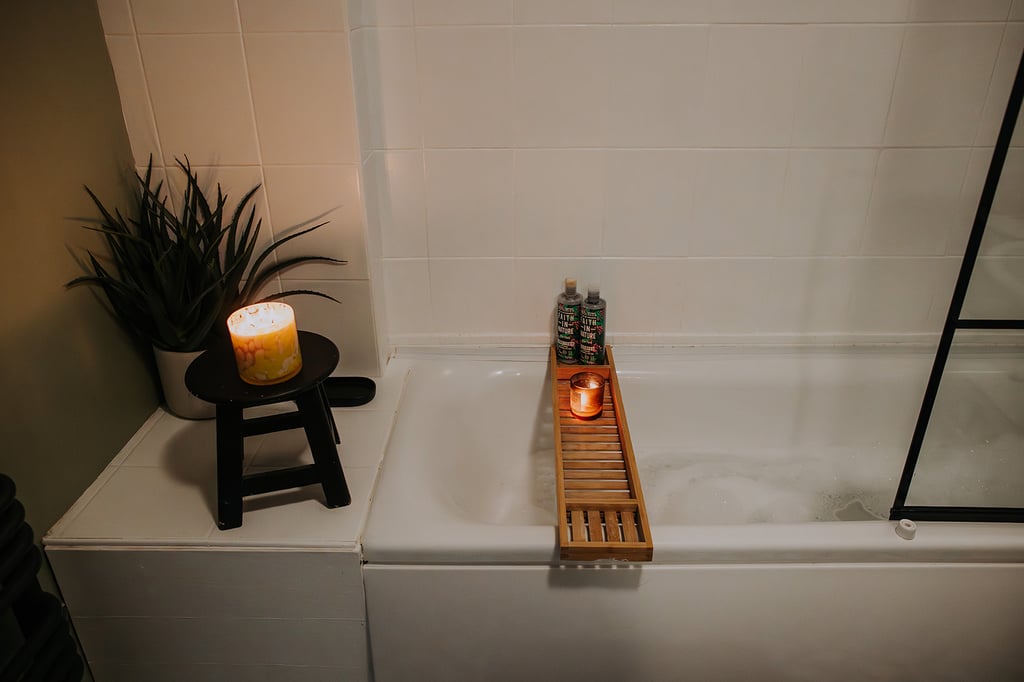 A candle alight in the pheasant lodge bathroom