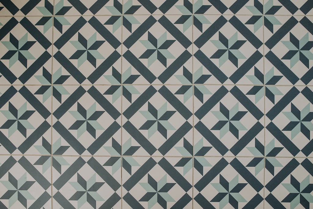 The tiled bathroom floor at the pheasant lodge