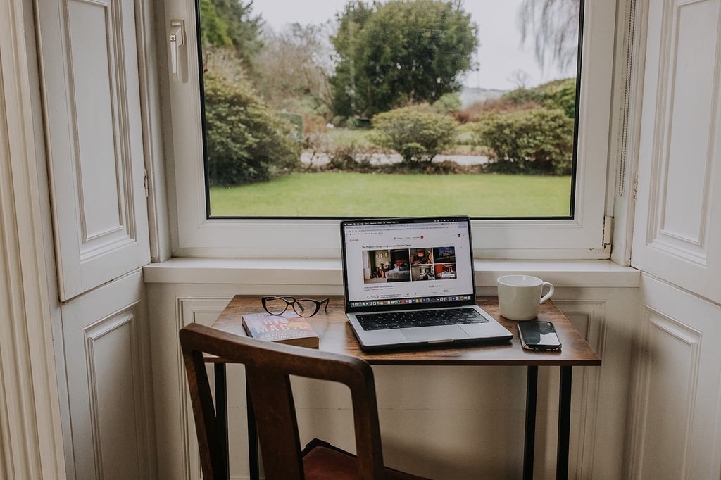 desk set up with computer in the master bedroom